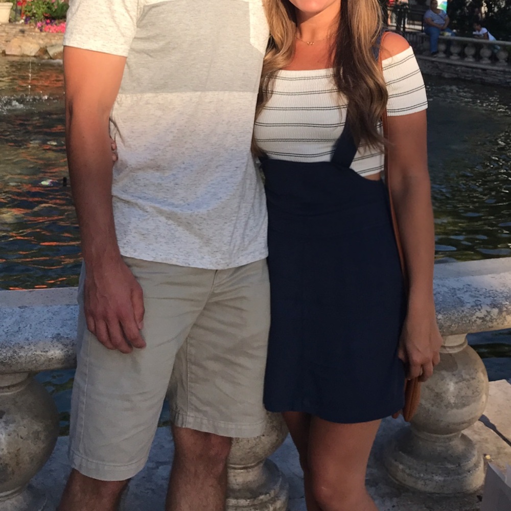 Blue overall dress from Urban Outfitters.